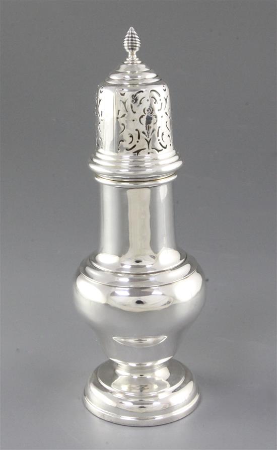 A George V silver sugar caster, Height 9 ½”/242mm Weight 8.4oz/238grms.